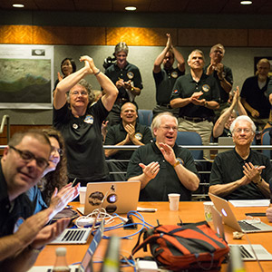 Part of the New Horizons team celebrating the spacecraft's flyby of Pluto.